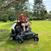 Front view of the Titan Pro 42-inch ride-on lawnmower showing the zero-turn caster wheels for unrestricted movement.