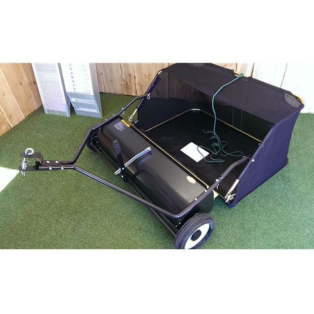 Towable lawn sweeper